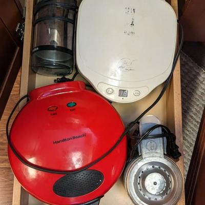 Contents of Lower Kitchen Cabinets (West)