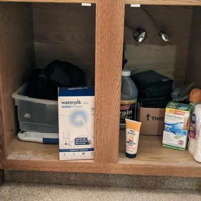 Contents Of Main Bedroom Bathroom and Vanity Area