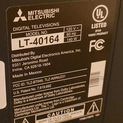 66: Mitsubishi TV with Remote