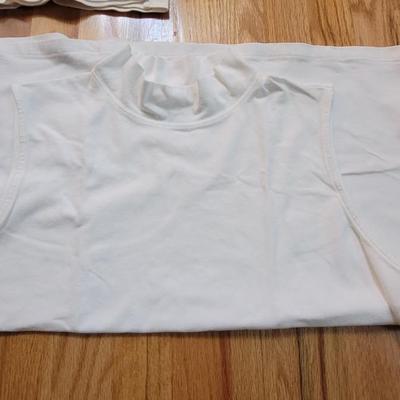 168: (2) Long Sleeve Turtle Necks and One Sleeveless