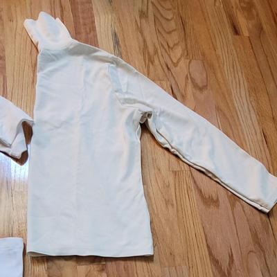 168: (2) Long Sleeve Turtle Necks and One Sleeveless