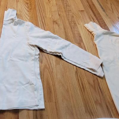 168: (2) Long Sleeve Turtle Necks and One Sleeveless