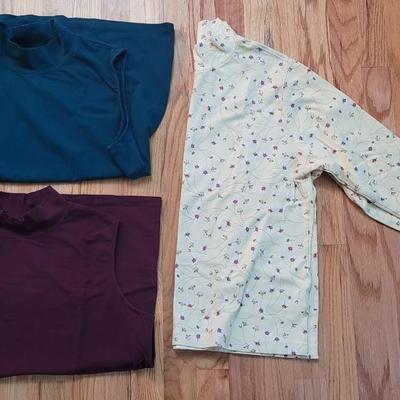 172: (2) Sleeveless Turtlenecks and One Long Sleeve