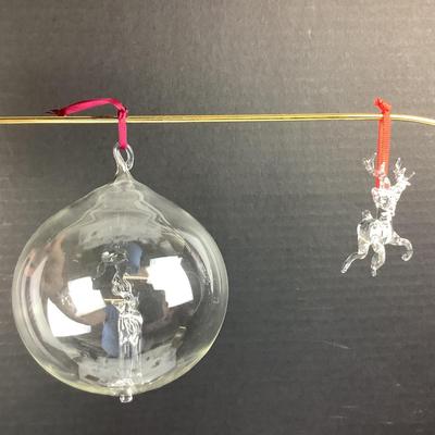 Lot 317. Pair of Clear Glass Reindeer Ornaments