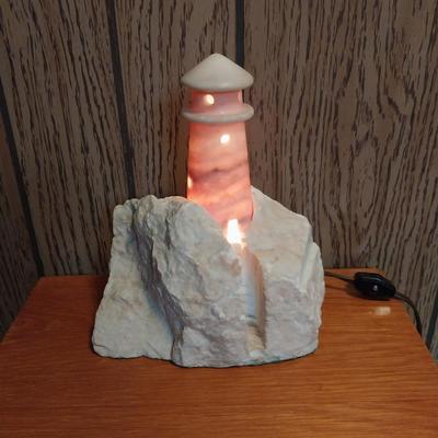WOODEN  THREE DRAWER CABINET AND STONE LIGHTHOUSE LIGHT