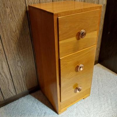 WOODEN  THREE DRAWER CABINET AND STONE LIGHTHOUSE LIGHT