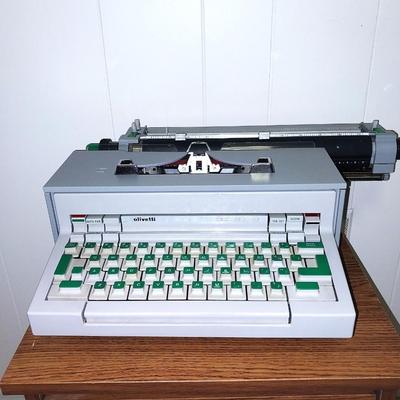 OLIVETTI ELECTRIC TYPEWRITER AND WOODEN TWO DRAWER STAND