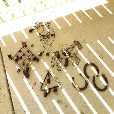RUSTIC BELLS HUNG FROM VARIETY OF SHAPES AND HORSESHOES