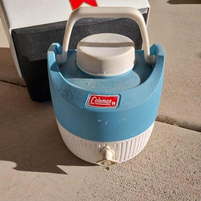 TWO ICE COOLERS AND COLEMAN WATER JUG