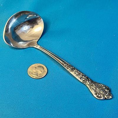 FANCY SMALL SERVING LADLE FLORAL HANDLE STAINLESS 