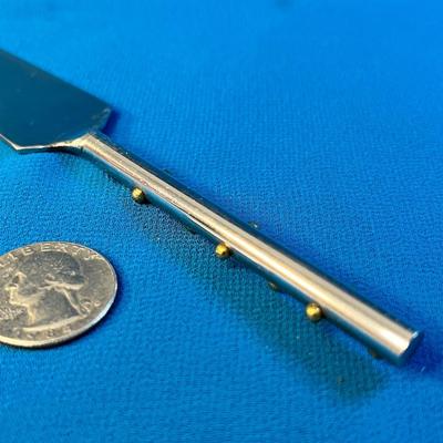 UNUSUAL METAL SERVING UTENSIL? STAINLESS STEEL w/ GOLD TONE KNOBS ON HANDLE