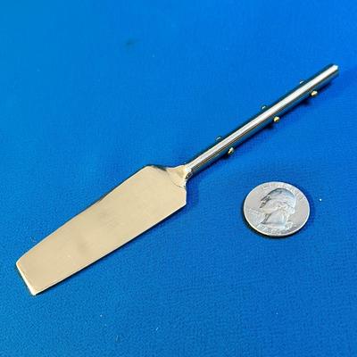 UNUSUAL METAL SERVING UTENSIL? STAINLESS STEEL w/ GOLD TONE KNOBS ON HANDLE