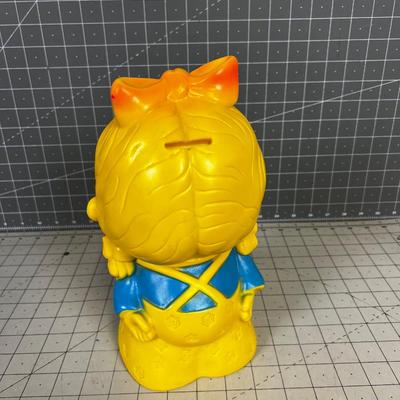 Vintage 1970's Piggy Bank of Plastic Yellow Girl 