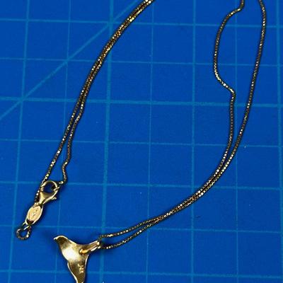 14 K Whale Tail Pendant on a chain. DARLING 
