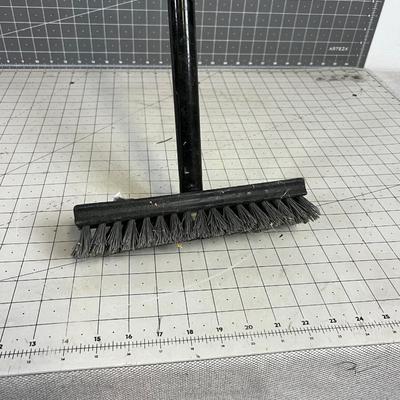 Scrub Brush with a long Handle. 