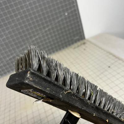 Scrub Brush with a long Handle. 