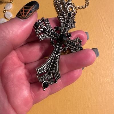 Crosses and religious jewelry including a beautiful rosary