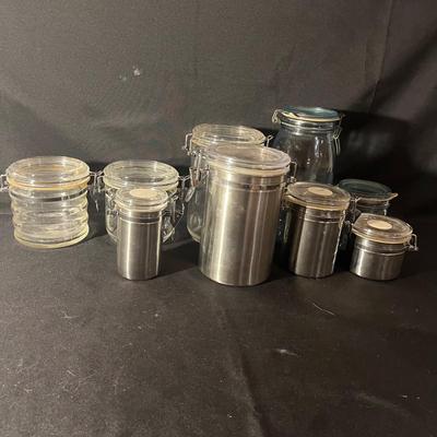 Ten Canisters With Flip Top Lids (K-MG)