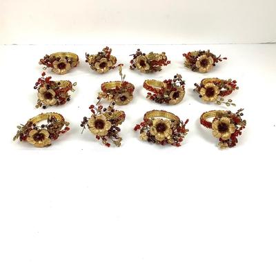 Lot 386 Set of Twelve Holiday Burnt Orange/Gold Beads with Gold Flowers Round Napkin Holders