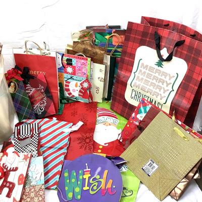 Lot 395  Holiday Gift Bags & Wrap