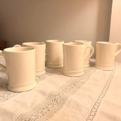 Set of 7 white mugs