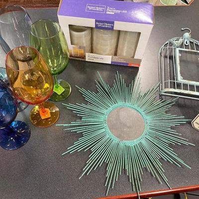 Plastic wine glasses and candles