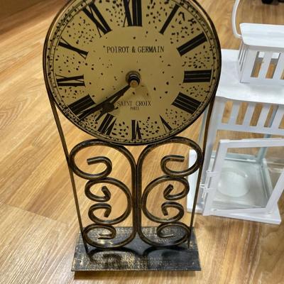 Clock, frame and candle holders
