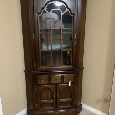Corner curio cabinet
