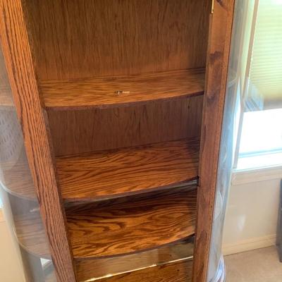 Rounded curio cabinet