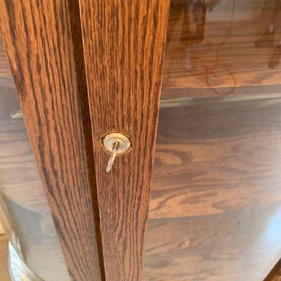 Rounded curio cabinet