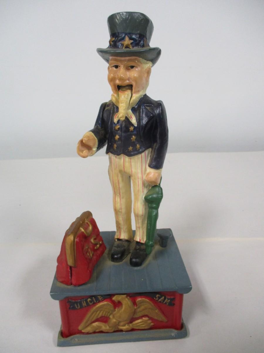 Cast Iron Uncle Sam Coin Bank | EstateSales.org