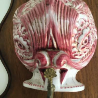 Vintage wall decorative fish fountain.