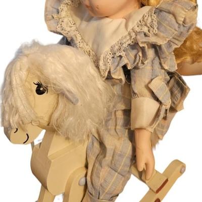 DOLL ON HORSE