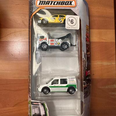 52 Hot Wheels, Matchbox Cars, and Track