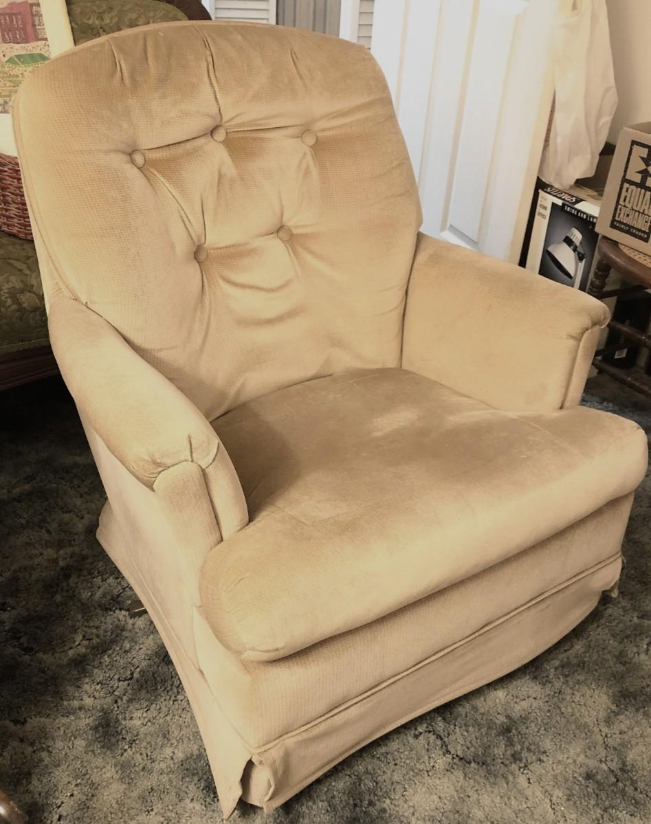Tan swivel rocking chair