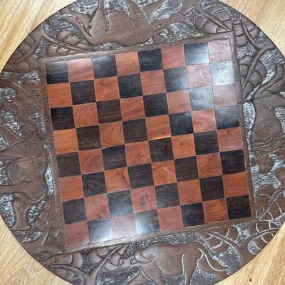 Wood circle decor with checkerboard on back