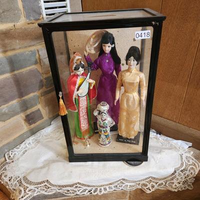 Display Case with Dolls