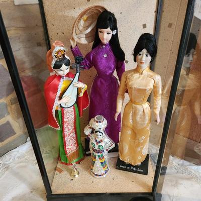 Display Case with Dolls