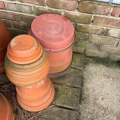 O1251 Lot of Terra Cotta and Plastic Pots with Saucers