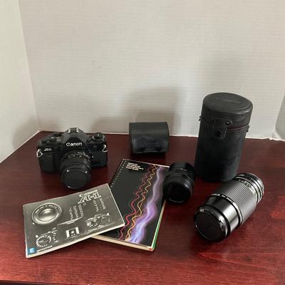 DO1338 CANON A-1 Camera with Lenses