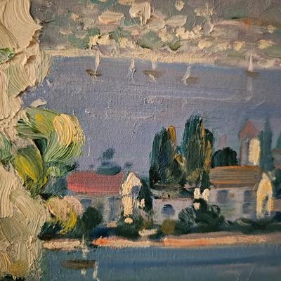 Large painting of pot of Flowers with Sea in the Background