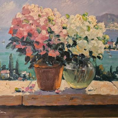 Large painting of pot of Flowers with Sea in the Background