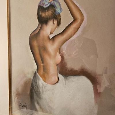 Large Nude putting an icepack on her head