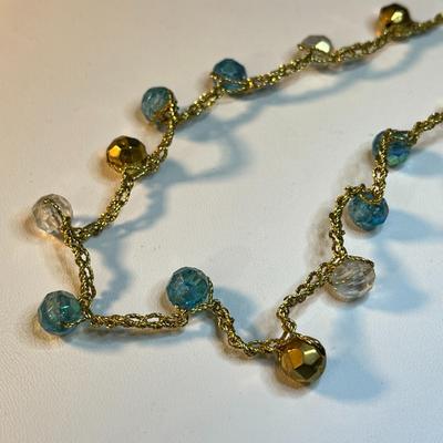VINTAGE DANGLY IRIDESCENT CLEAR, TURQUOISE, GOLD COLORED BEADS ON  GOLD CORD NECKLACE