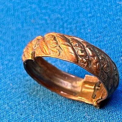 UNUSUAL COPPER HINGED RING? CLIP? WITH RAISED FLORAL DESIGN