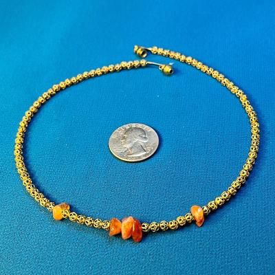 INTERESTING ORANGE STONE AND LACEY GOLD TONE BEAD NECKLACE
