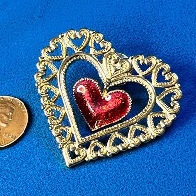 FANCY GOLD TONE OPEN WORK HEART PIN WITH DANGLY ENAMELED HEART IN CENTER