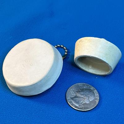 PAIR OF SINK/TUB STOPPERS 1-5/8â€ AND 1-1/4â€