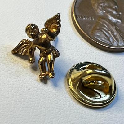 LITTLE GOLD TONE FIST BUMPING ;) ANGEL PIN