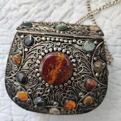 Small silver toned and bejeweled bag